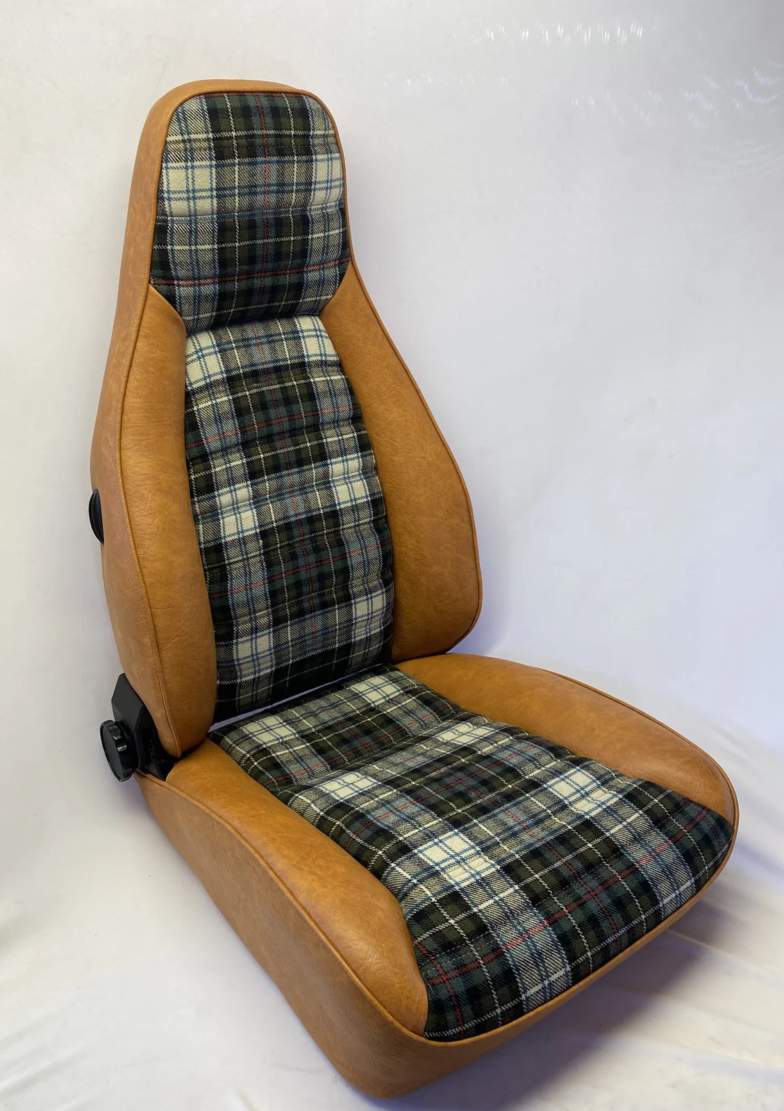 Restored Porsche 911 front seat in tan leather with original tartan fabric