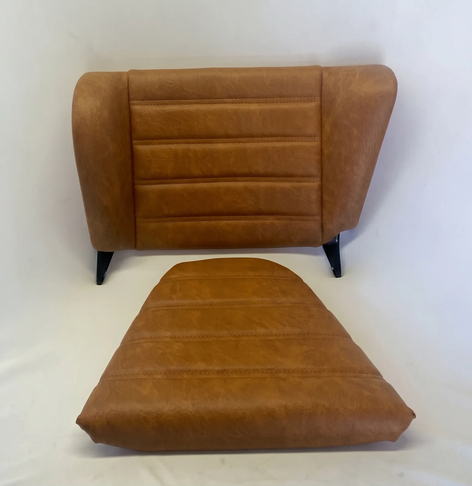 Pair of Porsche 911 rear seats trimmed in cognac tan leather