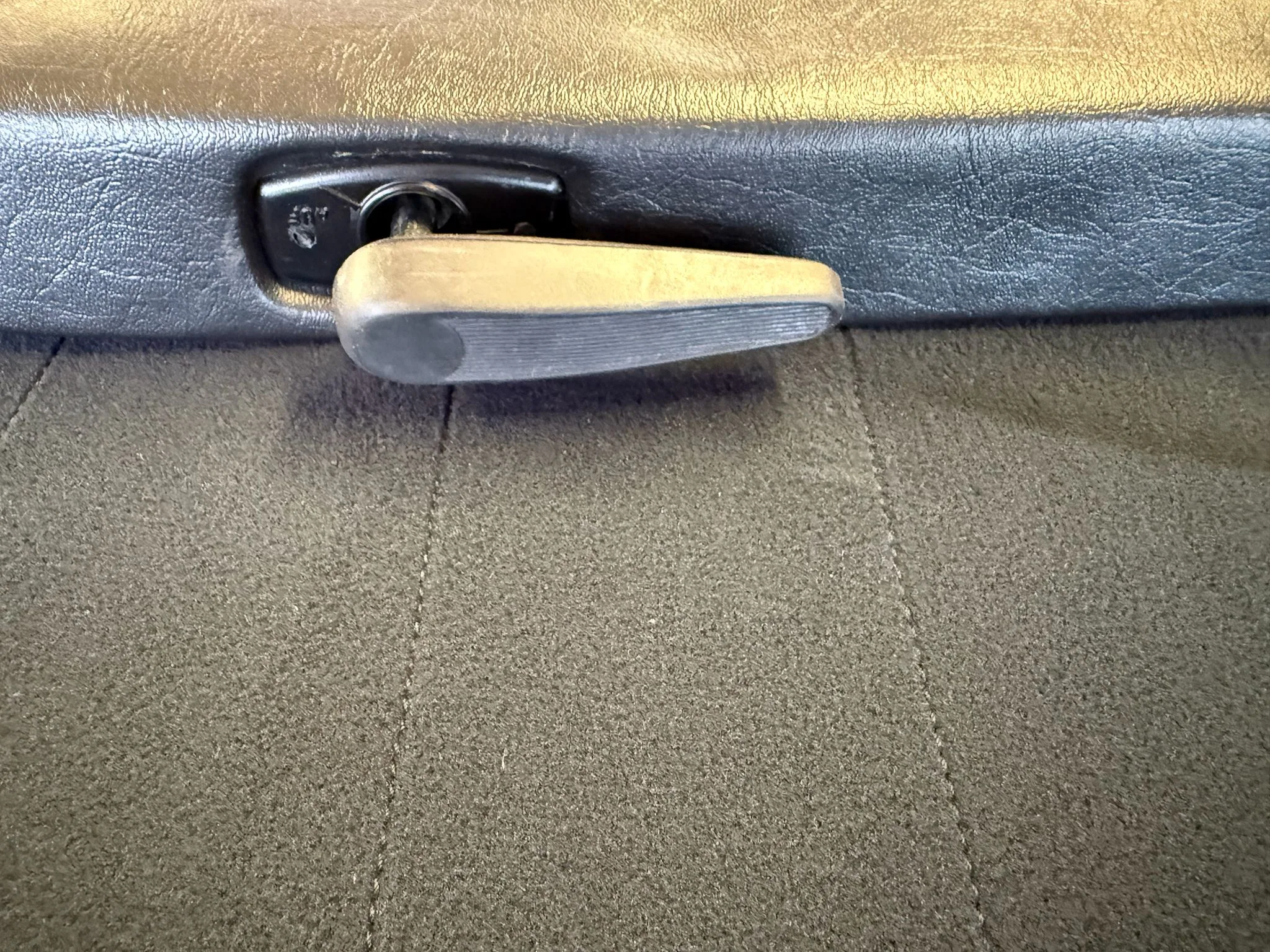 Detail of restored Porsche Targa roof opening lever