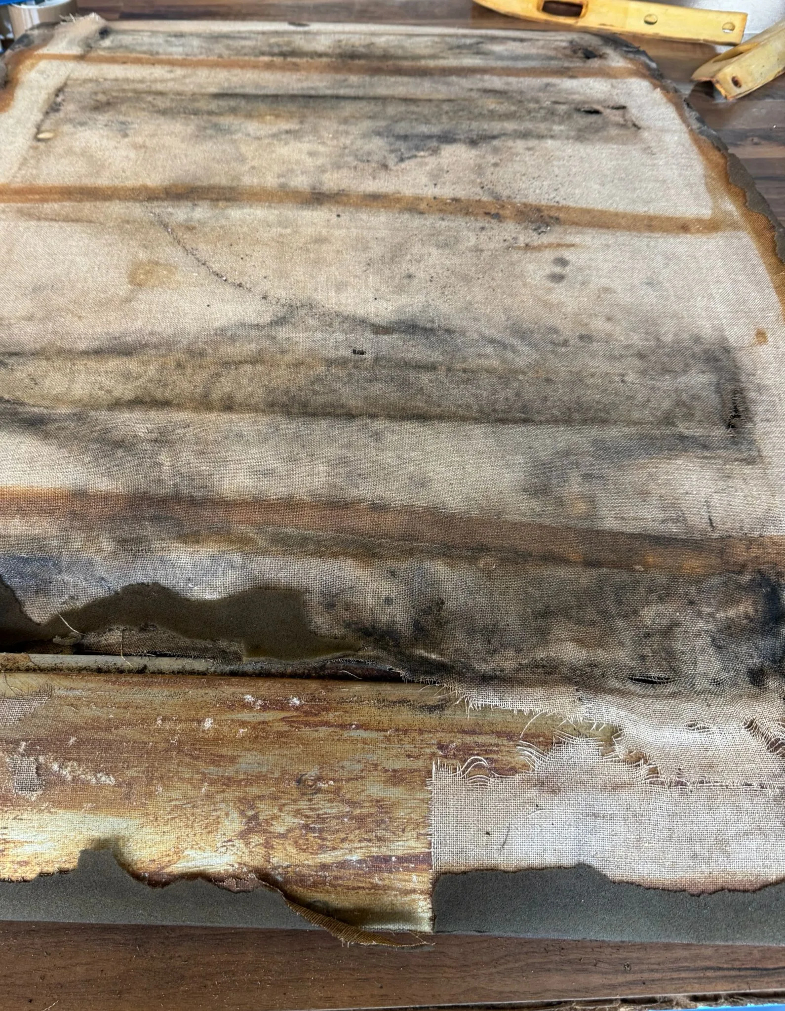 Porsche Targa roof before restoration: deteriorated and stained inner canvas